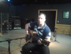 Dirk, one half of The father and son duo, the Jailbirds, tracking guitar