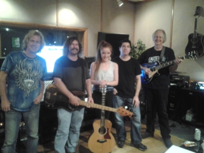 Grace Kelly of Wellington New Zealand doing a Nashville Trax recording session, L to Rt: L To Rt: Shawn Conley (engineer), Bill Watson (bass player & session producer) Grace Kelly (guitar, vocals), William Ellis drums, Tom Wild, guitar.